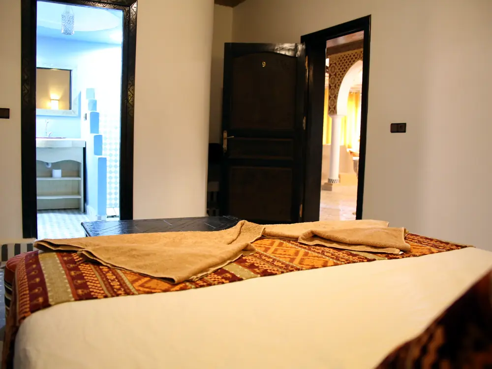 Double room with doorway to the en-suite bathroom