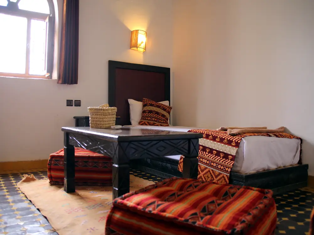 Single room with Berber textiles and low table