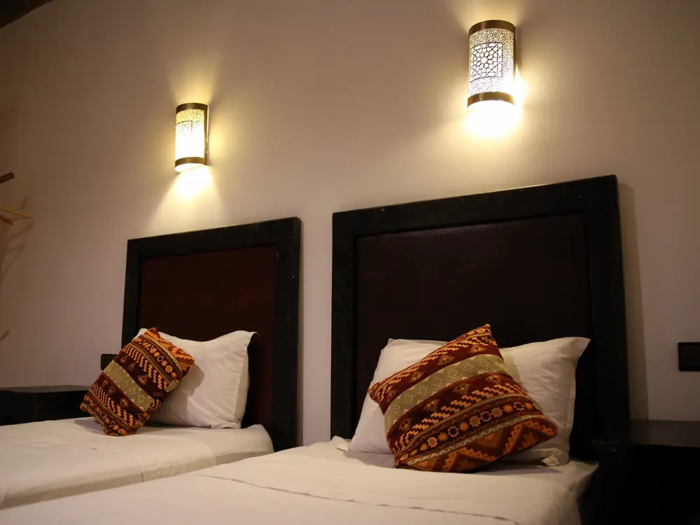 Twin room headboards and wall lanterns